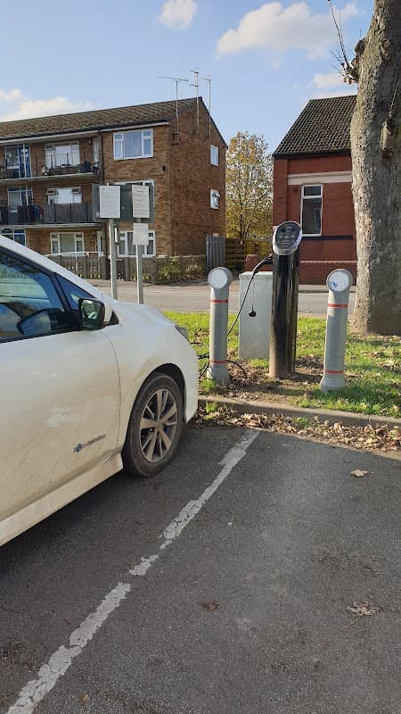 Free car park in Goole, Yorkshire, featuring a white car parked next to electric vehicle charging stations.