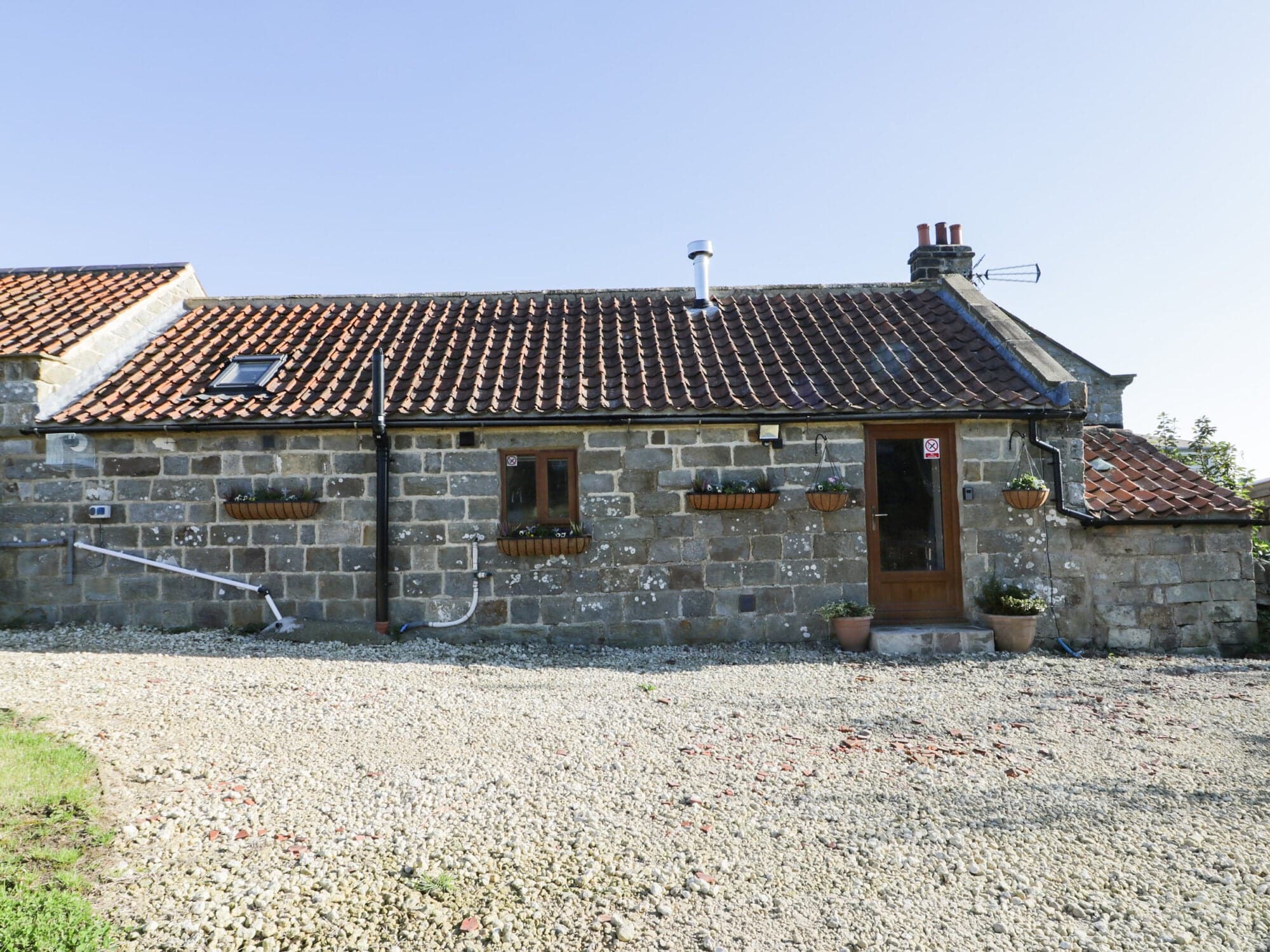 Accommodation at Dovecote Cottage in cloughton
