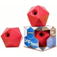 Red geometric-shaped Dripfeed toy by Red Gorilla, with faceted design and hexagonal opening, on branded packaging.