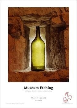 A textured, cream-colored paper featuring a green glass bottle illuminated against a stone wall, with "Museum Etching" and "Matt FineArt" printed at the bottom.