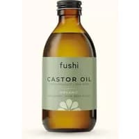 Amber glass bottle of Fushi Organic Castor Oil 250ml with green label and black cap.