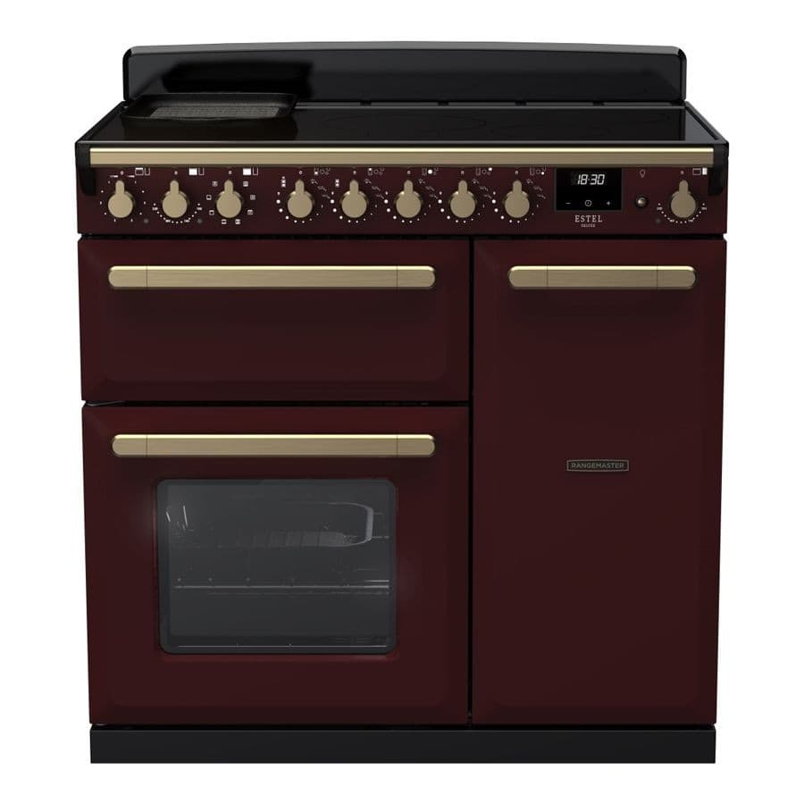 Bordeaux-colored 90cm induction range cooker with antique brass knobs, featuring a digital display, four cooking zones, and a large oven with a glass door.