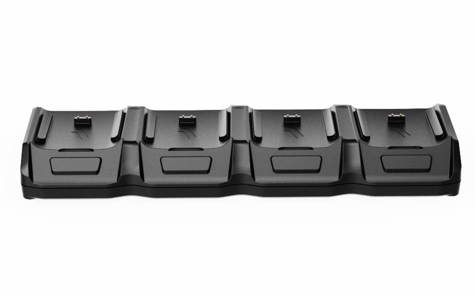 Black mobile device charger with four docking stations, featuring a sleek, durable design and connectors for AC indoor use.