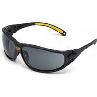 Black Caterpillar protective eyewear with yellow accents, wraparound design, and dark tinted lenses.