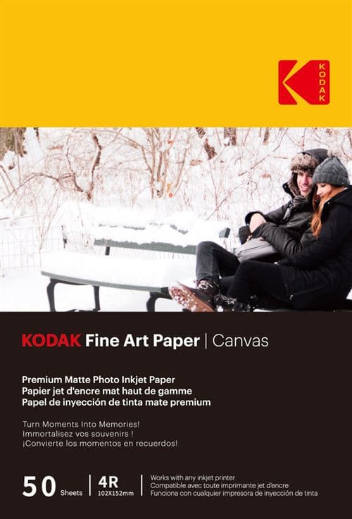 Premium matte photo inkjet paper pack by Kodak, featuring 50 sheets of 102x152mm canvas, with a bold red and yellow logo and a snowy outdoor scene on the cover.