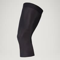 Black FS260 Thermo Knee Warmers by Endura, sleek design with elastic cuffs and smooth fabric for cycling warmth.