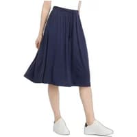 Navy blue Ragwear Reikko skirt with elastic waistband and side pockets, worn with white sneakers.