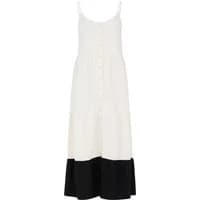 White sleeveless maxi dress with button front and black hem, by Protest Thecia.