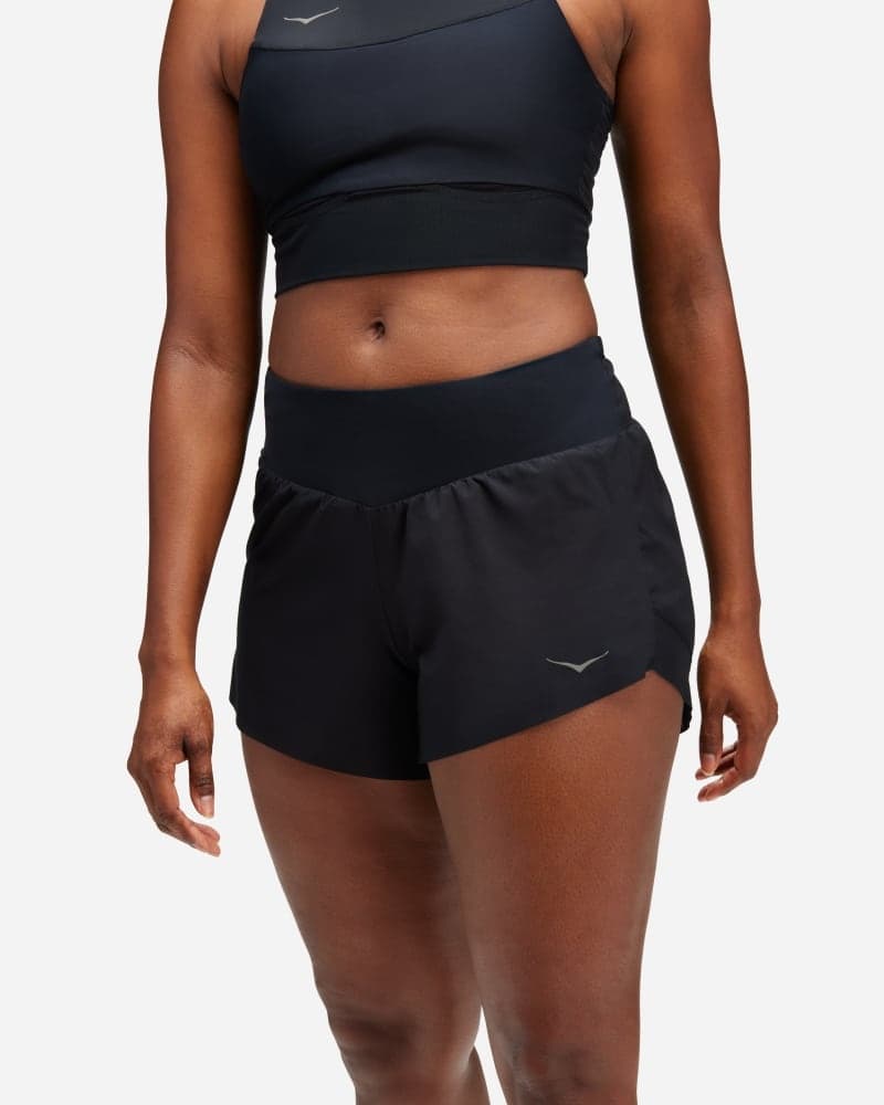 Black women's HOKA Glide shorts made from lightweight material, featuring a comfortable waistband and a sleek design, ideal for running or workouts.