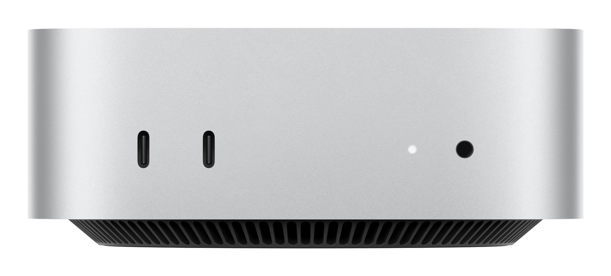 Silver Apple Mac Mini with a sleek, rounded design, featuring two Thunderbolt ports, a power indicator light, and a vented bottom for cooling.