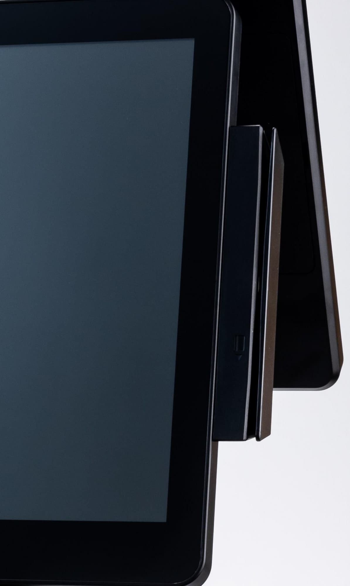 Black CAPTURE MSR device with a sleek design, featuring a smooth surface and a side-mounted card reader, ideal for Singry Nd Mn applications.