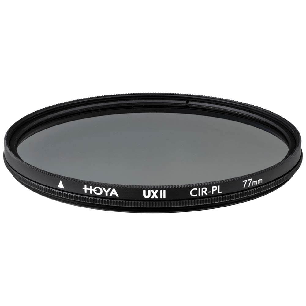Circular 77mm polarizing filter with a black metal frame, featuring "Hoya UX II CIR-PL" text in white, designed to enhance color and reduce reflections in photography.