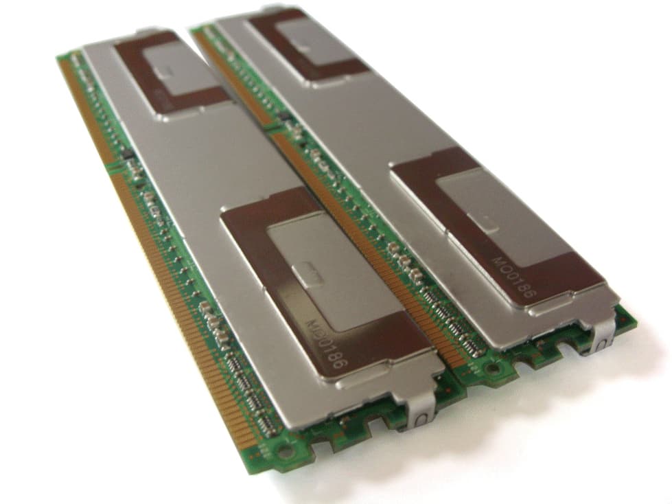 Two Hypertec 1GB PC2-5300 DDR2 memory modules, each 0.5 GB, featuring green circuit boards and metallic heat spreaders, designed for legacy systems.