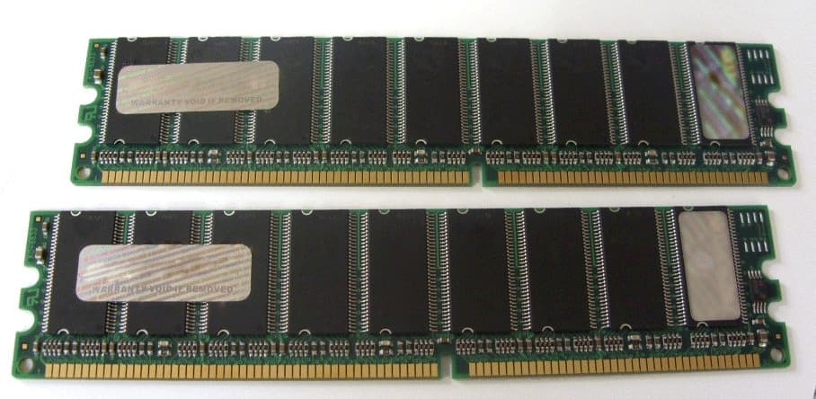 Two Hypertec 256MB ECC DIMM PC3200 memory modules, featuring a green circuit board with black memory chips and gold connectors, designed for DDR 400 compatibility.