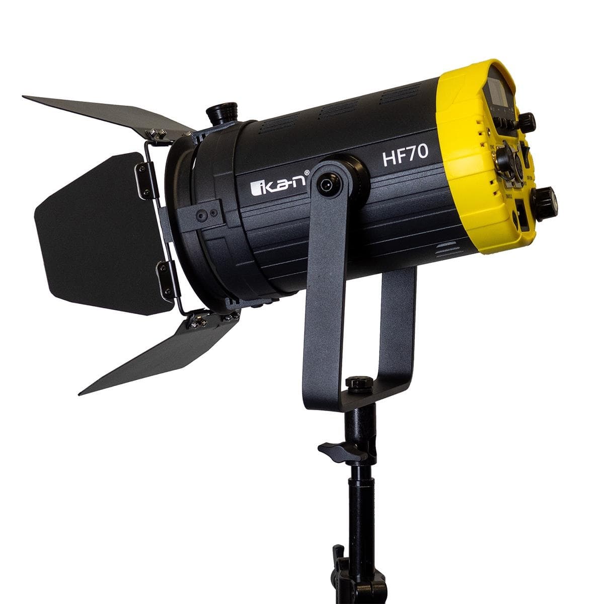 The Ikan HF70 Helia 70W Daylight LED Fresnel Light features a black body with a yellow front, adjustable barn doors, and DMX controls, mounted on a sturdy stand.