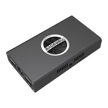 Compact gray metal converter with a circular MAGEWELL logo, featuring HDMI input/output ports and ventilation grilles on the sides.