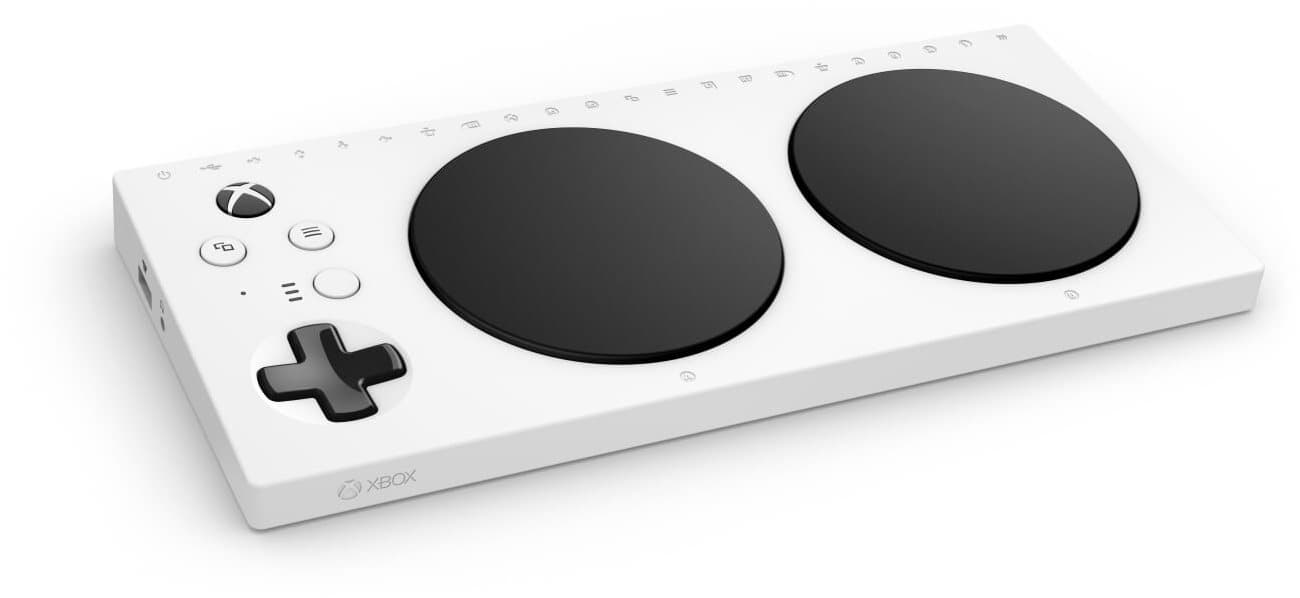 White Microsoft JMU-00003 gaming controller featuring two large black circular pads, a directional pad, and various buttons, designed for Xbox with a 3.5mm audio jack.