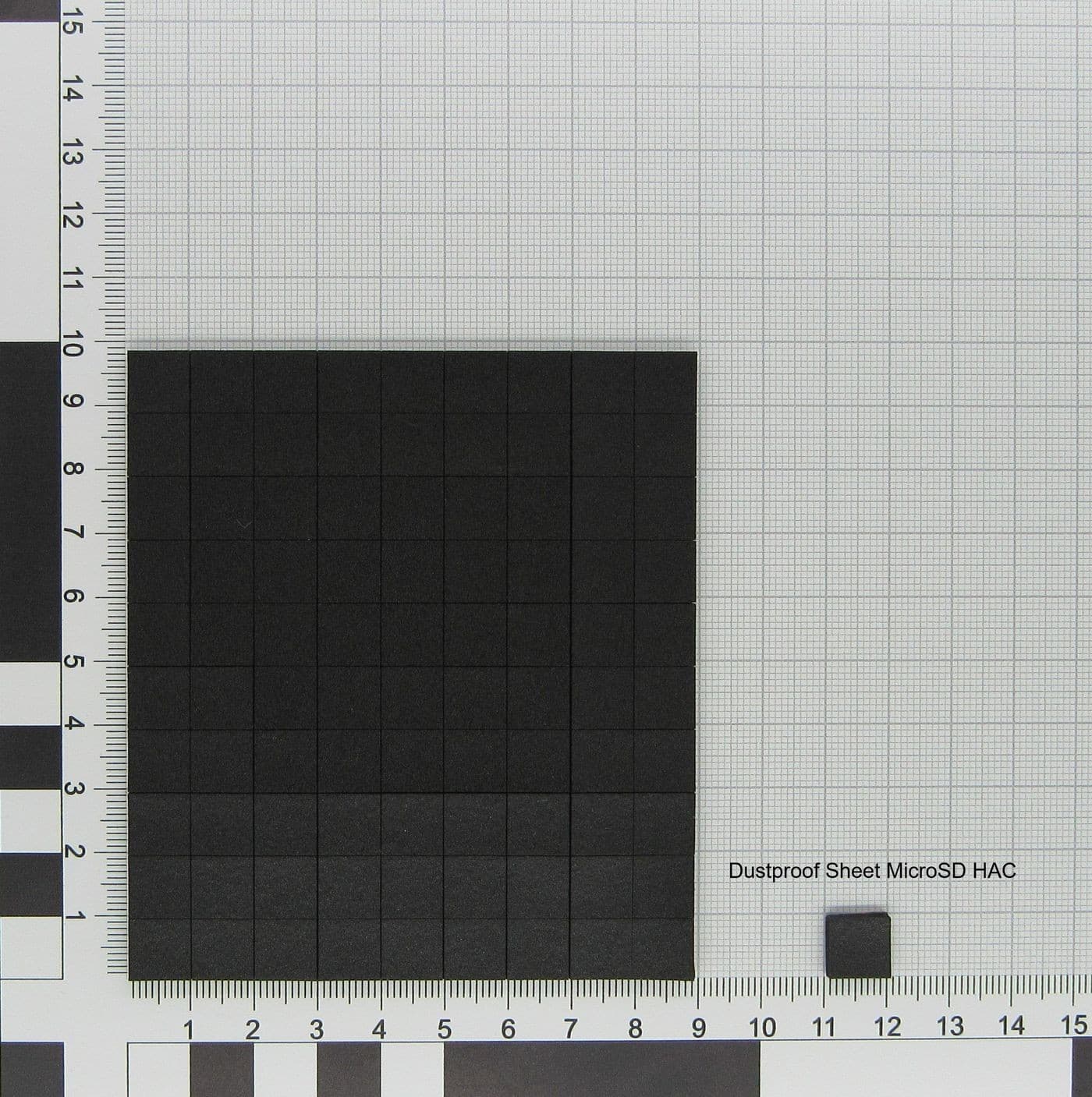 Black dustproof sheet with a grid pattern, featuring a smaller black square in the corner, labeled "Dustproof Sheet MicroSD HAC."