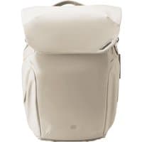 Sand-colored PGYTECH OneGo 2 backpack with sleek design, large flap closure, and side pockets.