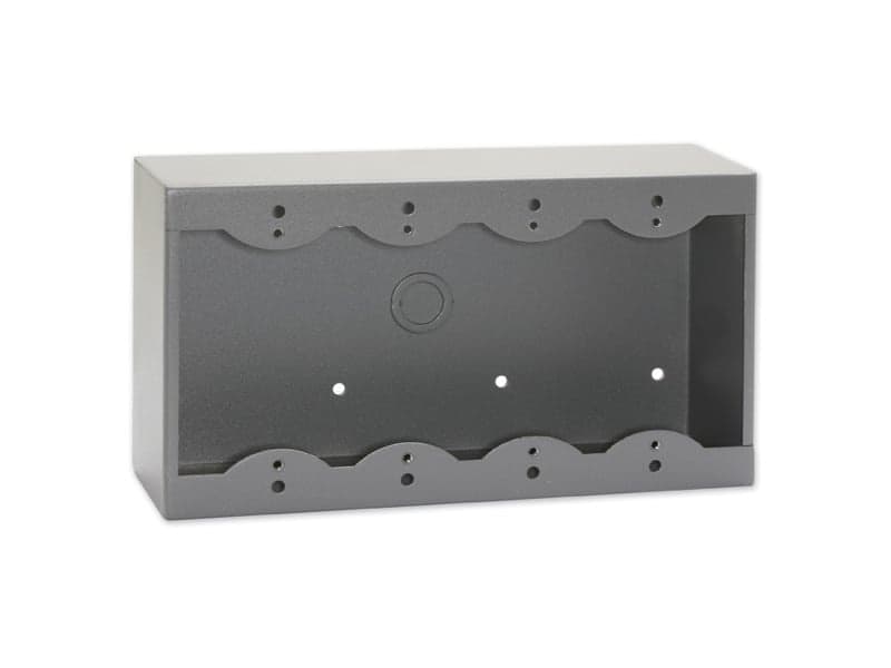 Black surface mount box designed for Decora remote controls and panels, featuring four mounting holes and a sleek, durable metal construction.