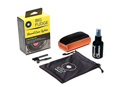 Big Fudge Vinyl Record Cleaning Kit featuring a black velvet brush, spray bottle of cleaning liquid, stylus brush, and a black storage pouch, all in a colorful box.