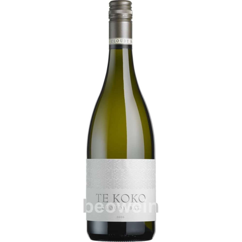 A green glass bottle of Cloudy Bay Te Koko Sauvignon Blanc 2023, featuring a silver cap and an elegant white label with embossed detailing and the name "TE KOKO" prominently displayed.