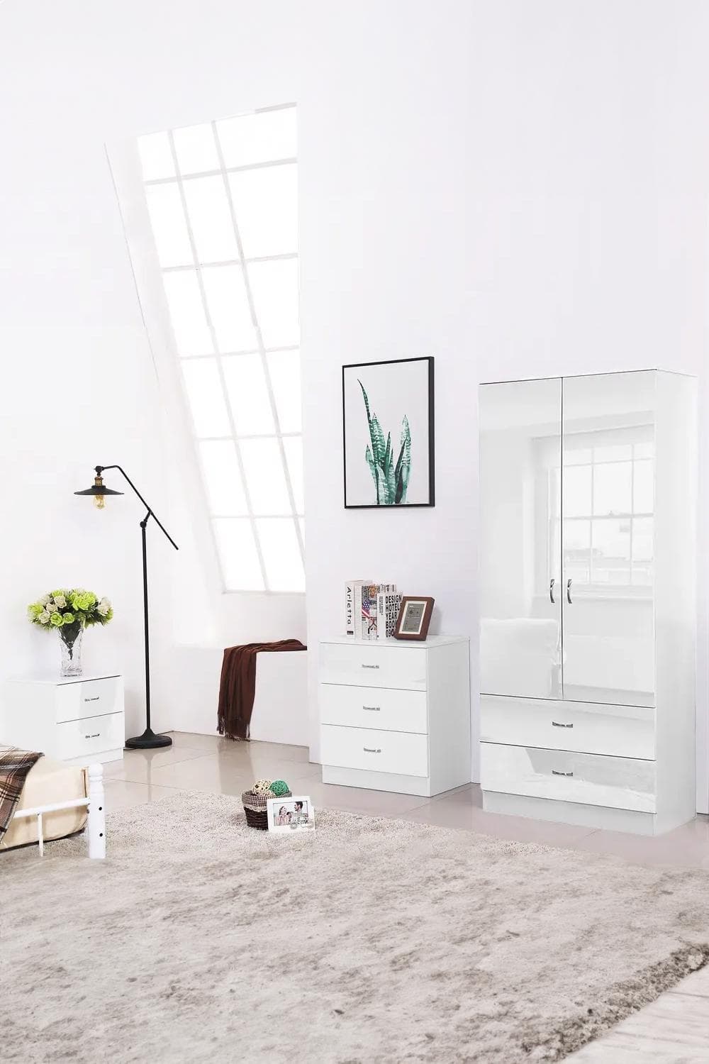 High gloss black wardrobe featuring two doors and two drawers, sleek design with a modern finish, complemented by a stylish interior setting with a lamp and decorative items.