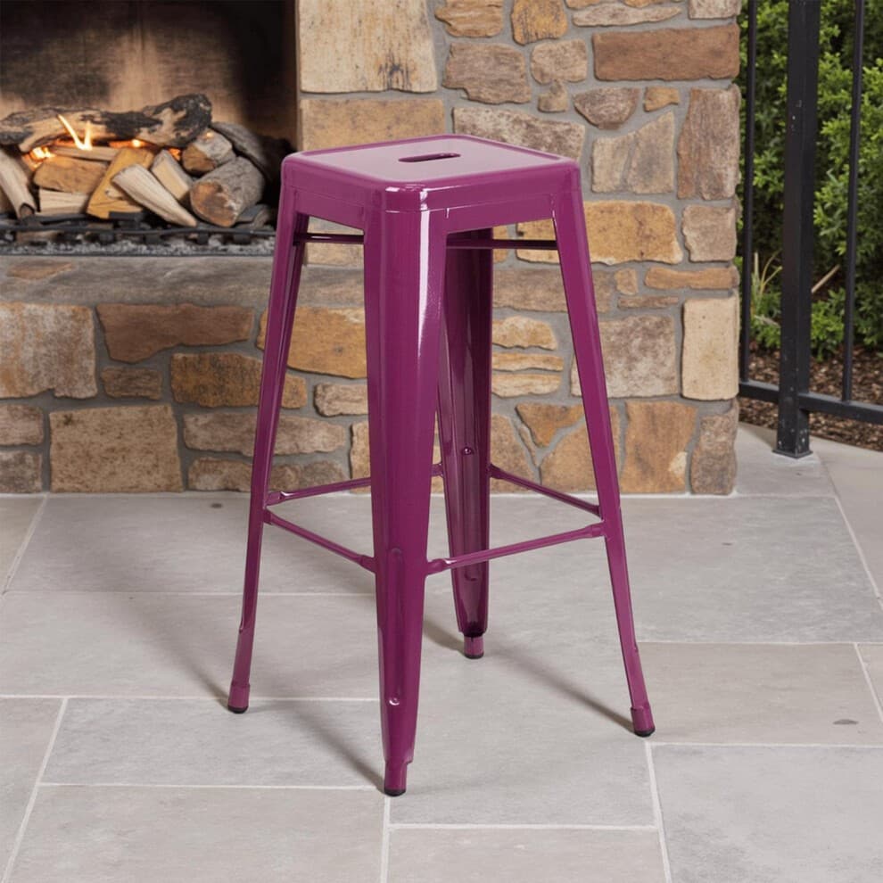 Set of four 30" purple metal bar stools made from galvanized steel, featuring a sleek design with a square seat and footrest, ready assembled for immediate use.
