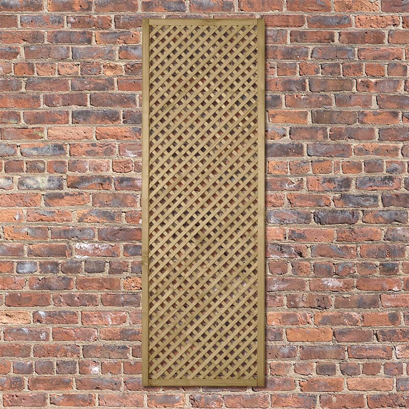 5'11" x 1'11" diamond lattice panel in natural wood finish, featuring a geometric lattice design, set against a rustic brick wall background.