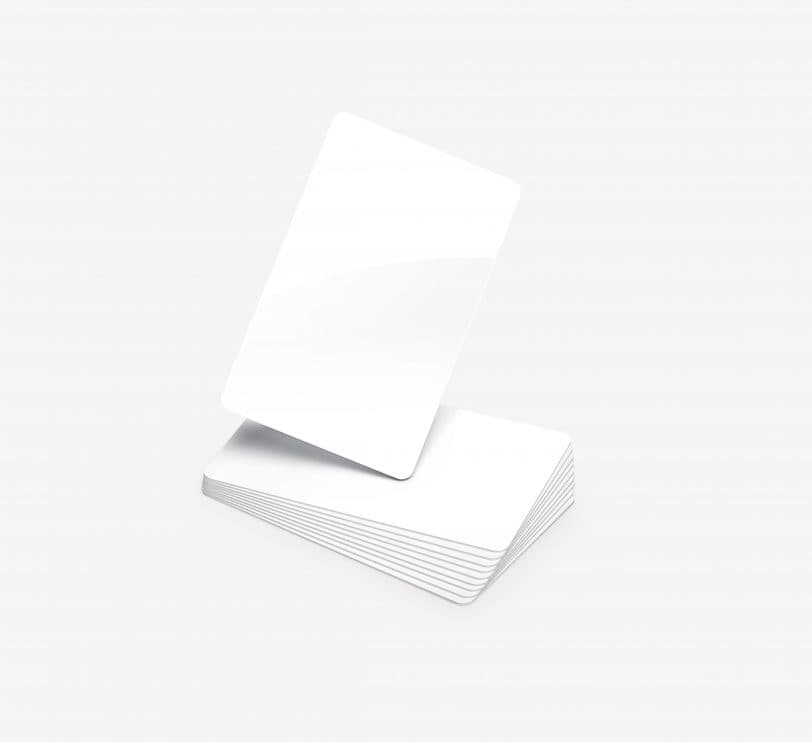 White ISO proximity cards stacked with one card slightly elevated, designed for use with Paxton Net2 systems, sold in a pack of 10, without a magnetic stripe.