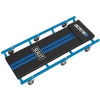 Blue Sealey Deluxe Creeper with padded black surface, blue frame, and six swivel casters.