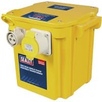 Yellow Sealey portable site transformer with dual sockets and carrying handle, 240v to 110v, 5Kva capacity.