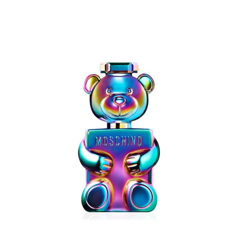 Colorful, iridescent bear-shaped bottle holding a blue label with "MOSCHINO," featuring a shiny finish and a square cap, representing the Moschino Eau De Parfum for women.