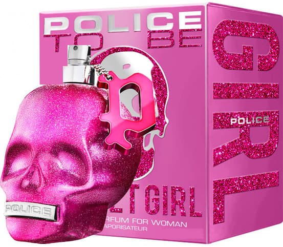 Bright pink skull-shaped bottle with glitter finish, silver cap, and a charm featuring the letter "P," alongside a matching pink box with sparkling text.