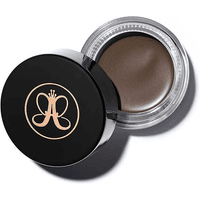 Black jar of Anastasia Beverly Hills Dipbrow Pomade in Medium Brown with gold logo on lid and creamy brown formula.