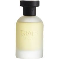 Frosted glass bottle of Bois 1920 Classic Paradise Eau de Parfum with black cap, embossed logo, and citrus fragrance.