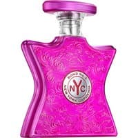 Pink star-shaped Bond No. 9 New York Gardenia perfume bottle with floral engravings and silver cap.