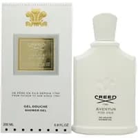White Creed Aventus For Her shower gel bottle with gold emblem, next to matching white box with gold accents, 200ml.