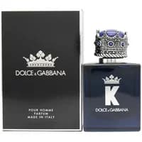 Dolce & Gabbana K Parfum 100ml bottle with crown-shaped cap, dark blue glass, next to black box with silver logo.