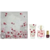 Escada gift set with heart-themed lotion, perfume bottle, and red nail polish in a decorative box.