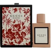 Gucci Bloom Eau De Parfum 50ml bottle with blush pink cap, floral-patterned box in red and white.