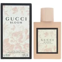 Gucci Bloom Eau De Toilette 50ml with floral box, beige rectangular bottle, and black-bordered label.