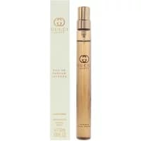Gold Gucci Guilty Pour Femme Eau De Parfum Intense 10ml bottle with matching box, sleek and cylindrical design.