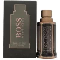 Hugo Boss The Scent Le Parfum 50ml, bronze-capped bottle with black label, next to matching black and bronze box.