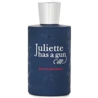 Navy blue Juliette Has a Gun Gentlewoman Eau De Parfum bottle with silver cap and white floral design.