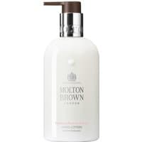White Molton Brown Rhubarb & Rose hand lotion bottle with silver pump and brown dispenser, 300 ml size.