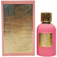 Pink Paris Corner Qissa Eau de Parfum bottle with gold cap, embossed floral design, and matching pink box.
