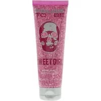 Pink tube of Police To Be Sweet Girl Body Lotion 100ml with skull design and glittery background.