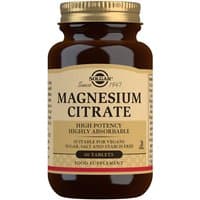 Brown bottle of Solgar Magnesium Citrate tablets with gold cap and beige label detailing high potency and vegan suitability.