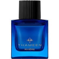 Blue Thameen Riviere Extrait de Parfum bottle with black ribbed cap and gold logo, 100 ml unisex leather fragrance.